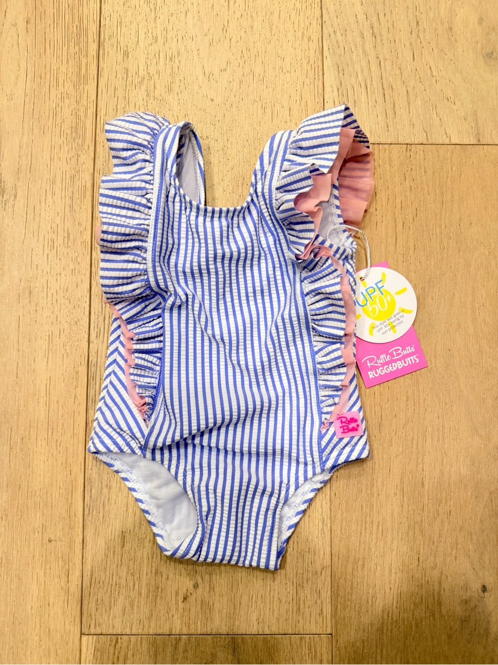 Ruffle Butts White and Blue Striped Baby Swimsuit